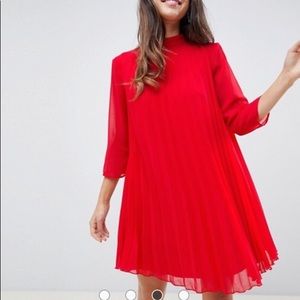 Red pleated dress